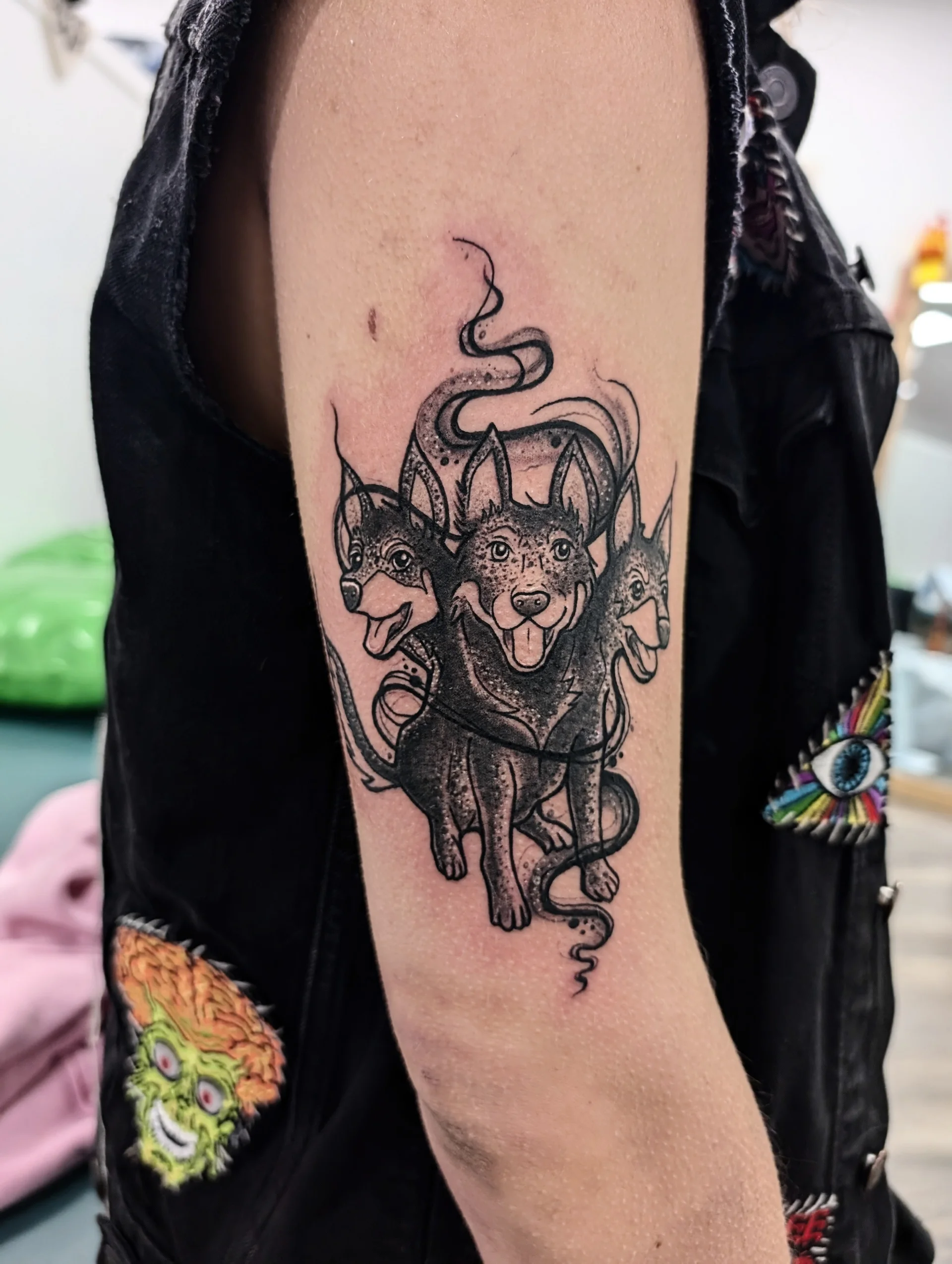 Three Headed Hellhound Cerberus - black and grey tattoo by Saskatoon tattoo artist