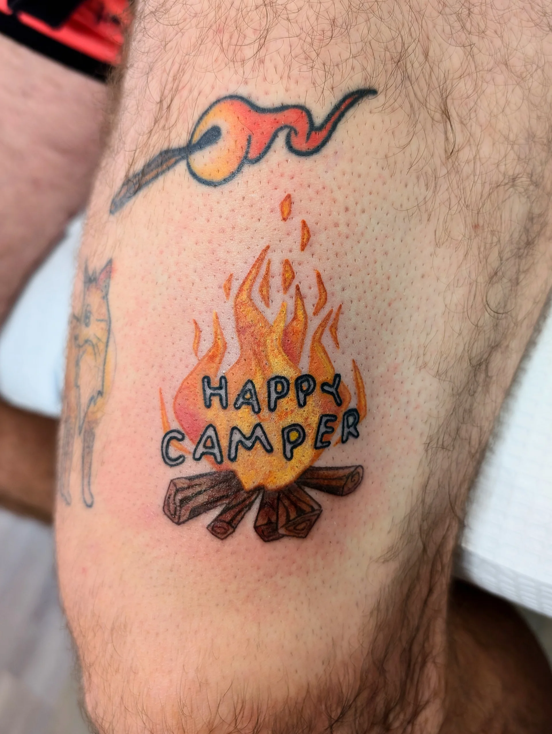 Happy Camper Campfire Marshmallow - illustrative tattoo by Saskatoon tattoo artist