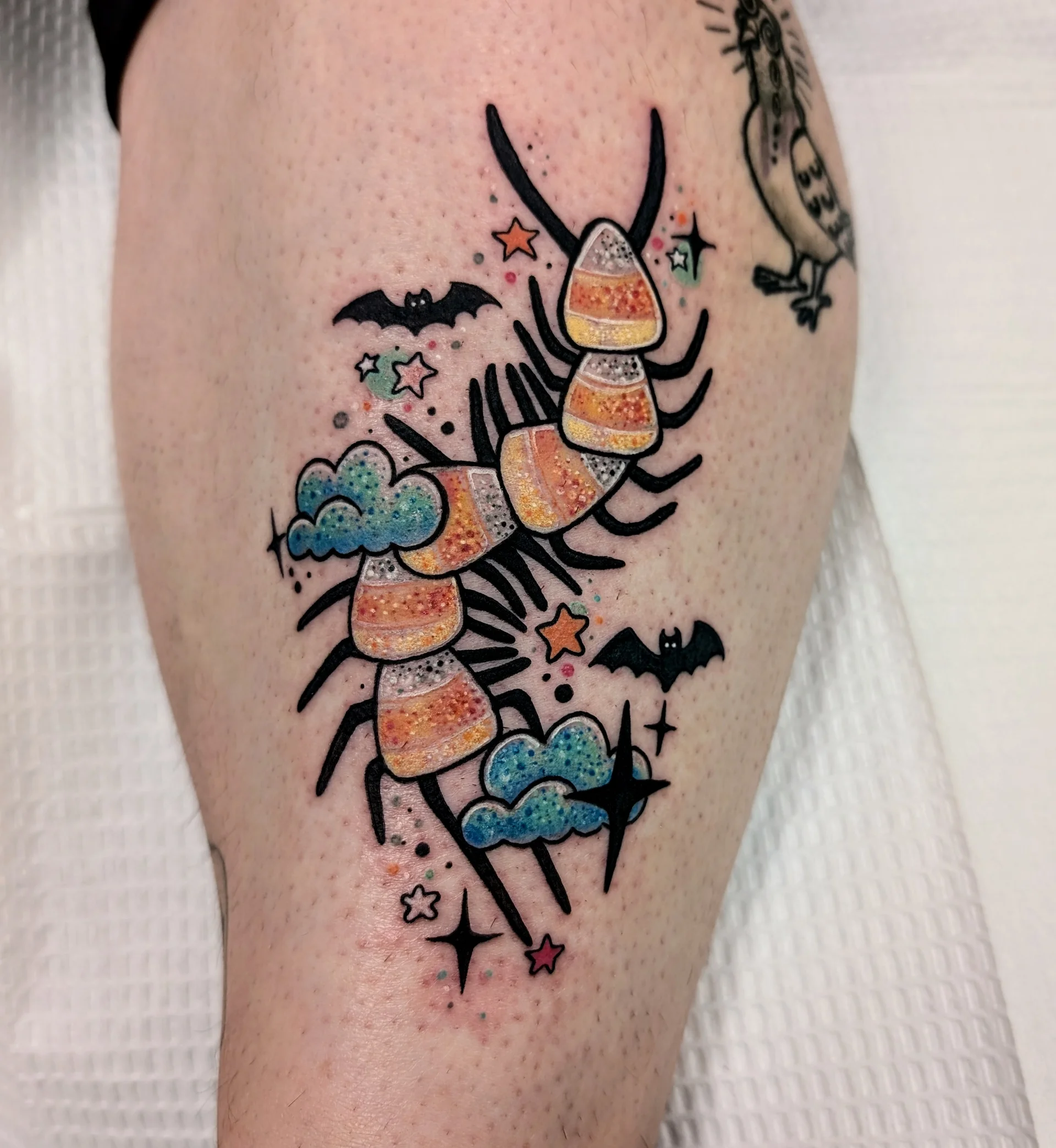 Candy Corn Centipede Clouds Bats - new school tattoo by Saskatoon tattoo artist