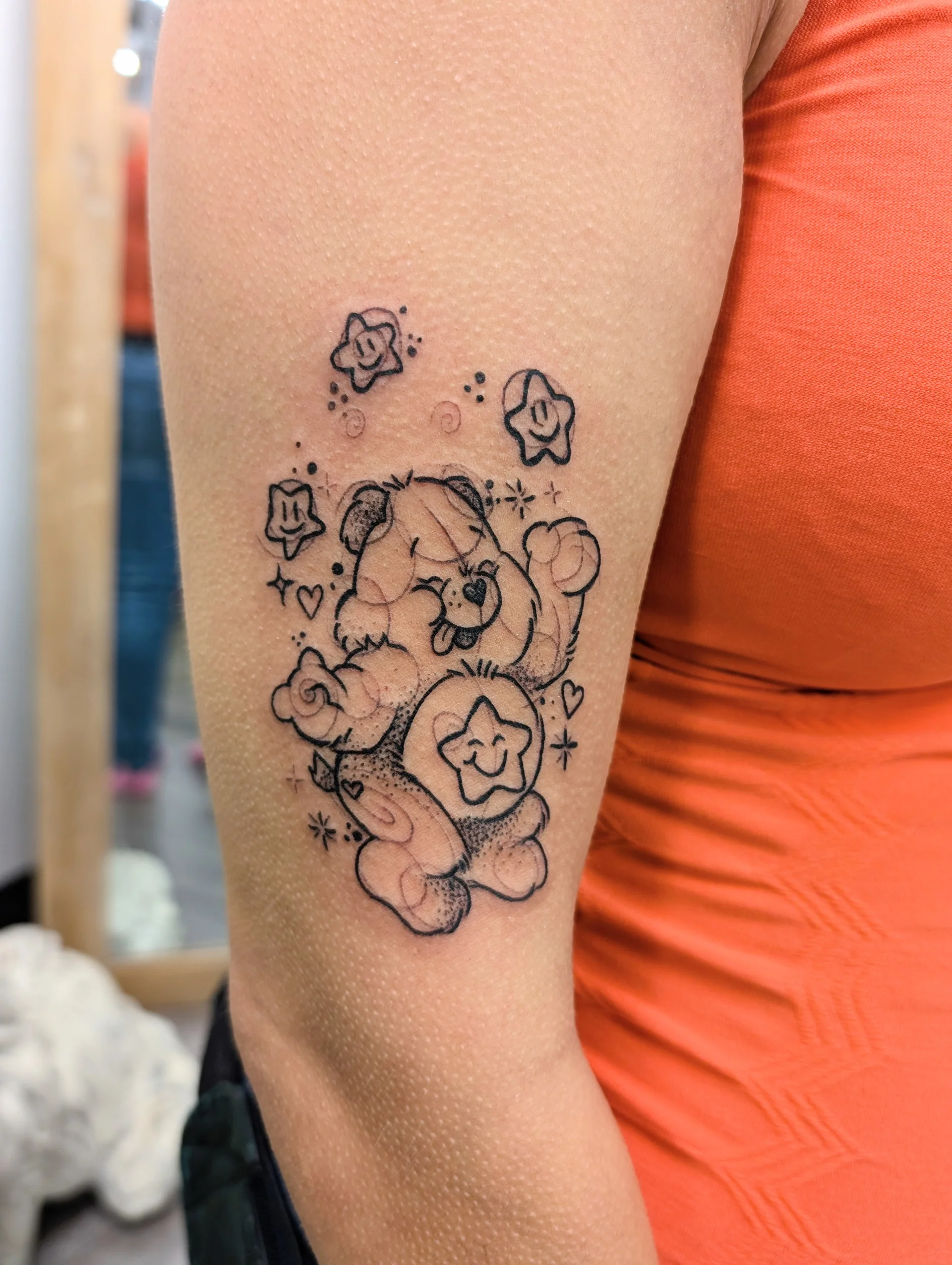 Care Bear Juggling Stars - new school tattoo by Saskatoon tattoo artist