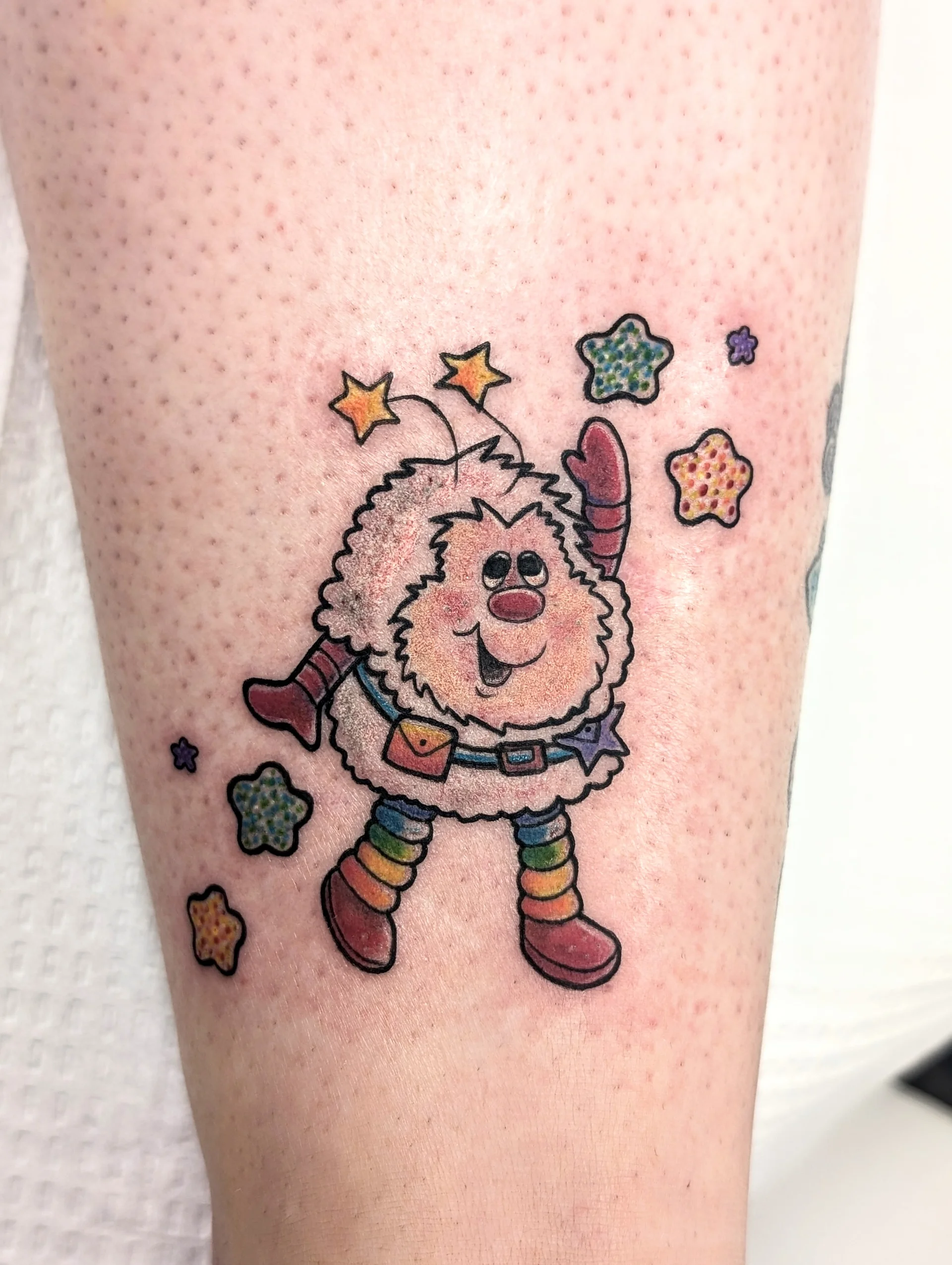 Rainbow Star Antenna Character - new school tattoo by Saskatoon tattoo artist